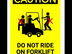 Sign caution do not ride on forklift